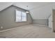 A spacious bedroom with neutral carpet, gray walls, a window with blinds, and an overhead light fixture at 100 Concord Ct, Fayetteville, GA 30214