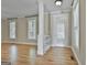 Bright and airy living room with hardwood floors and natural light at 100 Concord Ct, Fayetteville, GA 30214