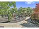 Community playground with playset and lush landscaping at 100 Concord Ct, Fayetteville, GA 30214