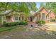 Beautiful backyard with patio, covered porch and mature landscaping at 9274 Betony Wood Trl, Jonesboro, GA 30236