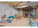 Unfinished basement space with concrete floor and visible utilities at 9274 Betony Wood Trl, Jonesboro, GA 30236