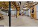 Unfinished basement offering ample storage space and potential for customization at 9274 Betony Wood Trl, Jonesboro, GA 30236