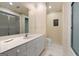 Well-lit bathroom offers a large vanity and a separate shower area at 9274 Betony Wood Trl, Jonesboro, GA 30236