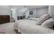 Bedroom featuring neutral paint, hardwood floors, and two twin beds at 9274 Betony Wood Trl, Jonesboro, GA 30236