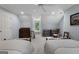 Spacious bedroom features two beds, a window seat, and natural light at 9274 Betony Wood Trl, Jonesboro, GA 30236