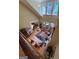 High-angle shot of a living room with a fireplace and lots of natural light at 9274 Betony Wood Trl, Jonesboro, GA 30236