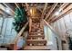 An unfinished wooden staircase leads to an upper level at 9274 Betony Wood Trl, Jonesboro, GA 30236