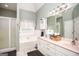 Bright bathroom with soaking tub, double vanity, and modern fixtures at 208 Summer Chase, Carrollton, GA 30116