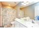 Bathroom featuring double sinks, shower and tub combo, and a neutral color scheme at 208 Summer Chase, Carrollton, GA 30116