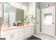 Spacious bathroom with dual sinks, ample counter space, and updated fixtures and lighting at 208 Summer Chase, Carrollton, GA 30116