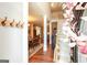Elegant foyer with hardwood floors, staircase, and open view into dining and living spaces at 208 Summer Chase, Carrollton, GA 30116