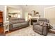 Bright and airy living room with a fireplace, comfortable seating, and an open floor plan at 208 Summer Chase, Carrollton, GA 30116