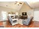 Comfortable living room with vaulted ceilings, a fireplace, and modern entertainment setup at 208 Summer Chase, Carrollton, GA 30116