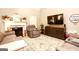 Cozy living room featuring a fireplace, modern furniture, and a decorative area rug at 208 Summer Chase, Carrollton, GA 30116