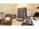 Office space with a recliner, desk, and window with gray curtains at 208 Summer Chase, Carrollton, GA 30116