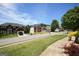Picturesque street view showcasing well-maintained homes, mature trees, and manicured lawns at 208 Summer Chase, Carrollton, GA 30116