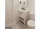 Bathroom with modern fixtures, vanity, toilet, and shower at 1875 Bernice Dr, Cumming, GA 30041