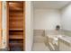 Bathroom features a sauna and jacuzzi tub with tiled steps at 1875 Bernice Dr, Cumming, GA 30041