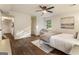 Comfortable bedroom with a ceiling fan, a soft-toned rug and a neutral palette to create a relaxing retreat at 1875 Bernice Dr, Cumming, GA 30041