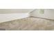 Bright, spacious bedroom with angled ceilings, neutral carpet and window view at 1875 Bernice Dr, Cumming, GA 30041