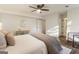 Bright bedroom featuring a ceiling fan, providing a fresh and airy ambiance with natural light and a calming color scheme at 1875 Bernice Dr, Cumming, GA 30041