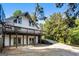 Features of this home include a deck, basketball hoop, and an expansive driveway for entertainment at 1875 Bernice Dr, Cumming, GA 30041
