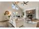 Inviting living room with fireplace, vaulted ceiling, and hardwood floors at 1875 Bernice Dr, Cumming, GA 30041