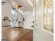 View from the foyer into a living room with hardwood floors and an open airy floorplan at 1875 Bernice Dr, Cumming, GA 30041