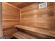 Wood sauna features built-in wooden bench seating at 1875 Bernice Dr, Cumming, GA 30041