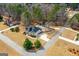 A charming two-story home boasts a well-manicured lawn, set in a tranquil neighborhood with mature trees at 1202 Persimmon Way, Mcdonough, GA 30252
