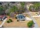 Aerial view of a house with manicured lawn and long drive way at 1202 Persimmon Way, Mcdonough, GA 30252