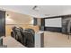 Finished basement with theater seating, projector, and home theater setup at 1202 Persimmon Way, Mcdonough, GA 30252