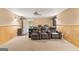 Finished basement with theater seating, projector, and home theater setup at 1202 Persimmon Way, Mcdonough, GA 30252
