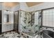 Elegant bathroom showcasing a glass shower, standalone tub, and stylish modern vanity at 1202 Persimmon Way, Mcdonough, GA 30252