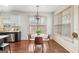 Cozy breakfast nook with natural light and views from surrounding windows at 1202 Persimmon Way, Mcdonough, GA 30252