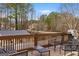 Deck with outdoor seating and grill, perfect for gatherings and overlooking a lovely backyard at 1202 Persimmon Way, Mcdonough, GA 30252