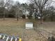 Fenced backyard with mature trees, storage shed and space for outdoor activities with lots of foliage at 2195 Wilson Nw Rd, Conyers, GA 30012