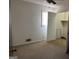 Bedroom with neutral carpet and walls, ceiling fan, one window, and closet with open doors at 2195 Wilson Nw Rd, Conyers, GA 30012