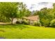 Spacious backyard with lush greenery, perfect for outdoor activities and relaxation at 130 Brooklet Way, Brooks, GA 30205