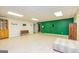 Large basement featuring vinyl floors and white and green painted walls at 130 Brooklet Way, Brooks, GA 30205