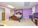 Finished basement bedroom with hardwood style flooring and closet at 130 Brooklet Way, Brooks, GA 30205
