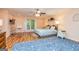 Bright bedroom featuring hardwood floors, two windows and warm accents throughout at 130 Brooklet Way, Brooks, GA 30205