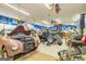 Spacious garage featuring classic cars, equipment, and ample workspace for automotive enthusiasts at 130 Brooklet Way, Brooks, GA 30205