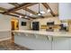 Kitchen with island, long countertop and breakfast bar at 130 Brooklet Way, Brooks, GA 30205