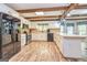 Spacious kitchen with white cabinets, stainless steel appliances, and a large island at 130 Brooklet Way, Brooks, GA 30205
