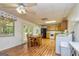 Basement kitchenette with wooden cabinets, appliances, and a dining table at 130 Brooklet Way, Brooks, GA 30205