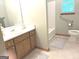 Functional bathroom featuring a vanity, toilet, and a shower/tub combination with neutral color palette at 305 Glenloch Ln, Stockbridge, GA 30281