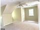 Cozy bedroom featuring neutral walls, carpeted floors, and a ceiling fan for added comfort and ventilation at 305 Glenloch Ln, Stockbridge, GA 30281