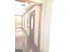 Welcoming entryway with hardwood floors, decorative molding, and a view into the adjacent living space at 305 Glenloch Ln, Stockbridge, GA 30281