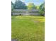 Expansive backyard with a well-maintained lawn, providing plenty of space for outdoor activities at 229 Timberland Trl, Riverdale, GA 30274